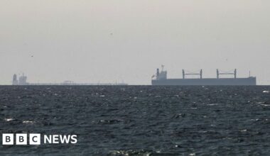 Strait of Hormuz closed again, Iran says, as ships attacked - BBC