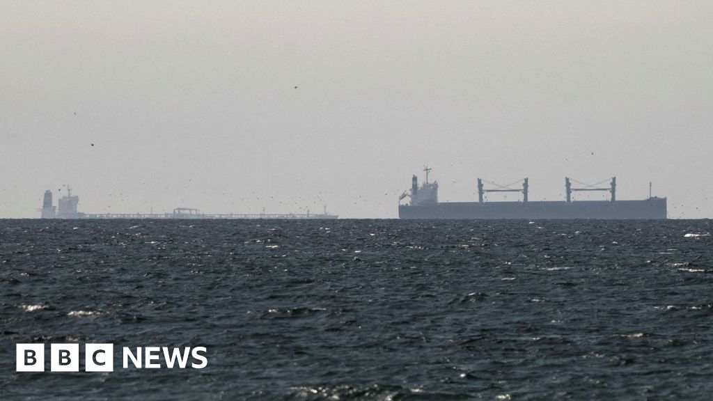 Strait of Hormuz closed again, Iran says, as ships attacked - BBC