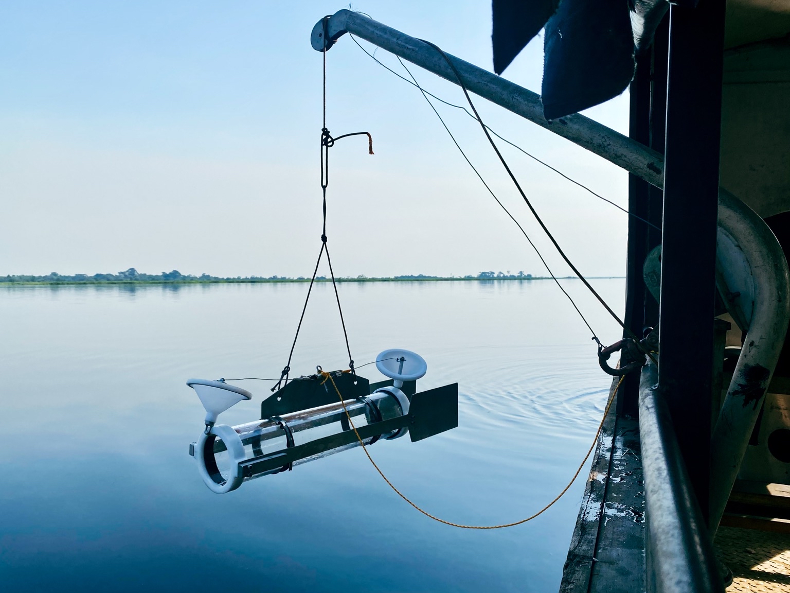 A “Van Dorn sampler,” made in-house at ETH Zürich, is used to sample water from depth. After lowering the sampler to the desired depth, a manual trigger is released, causing both ends to snap shut. Image courtesy of Matti Barthel.