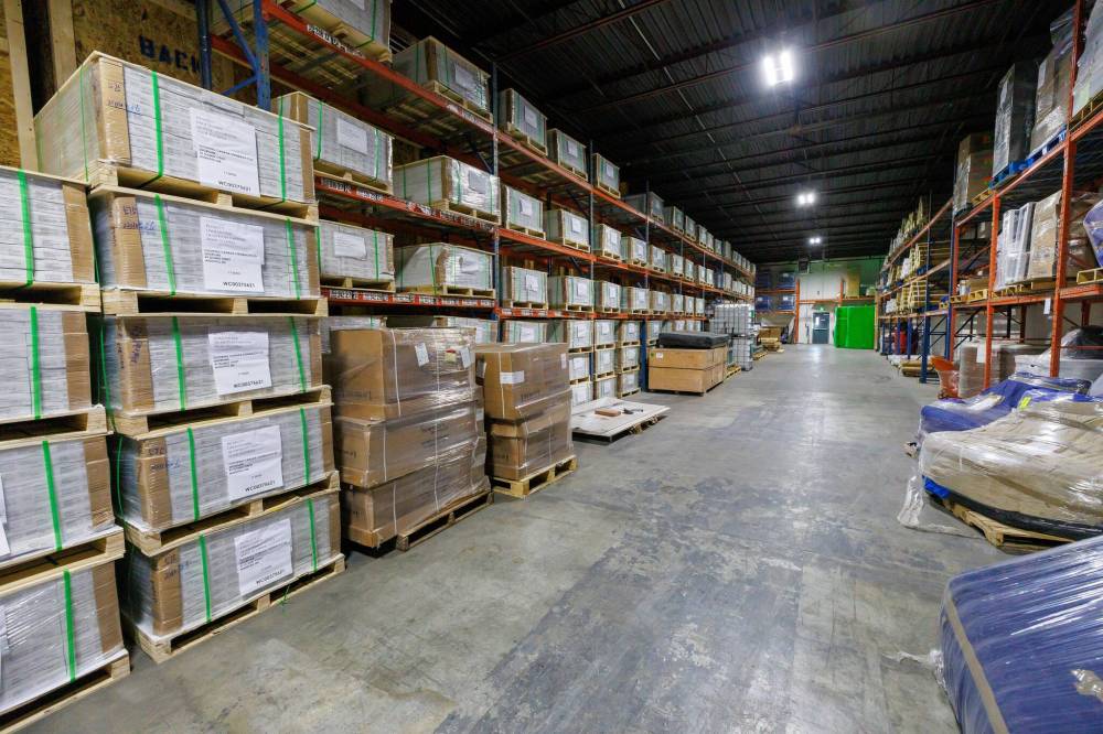 MIKE DEAL / FREE PRESS
>The Shortline warehouse full of client inventory.