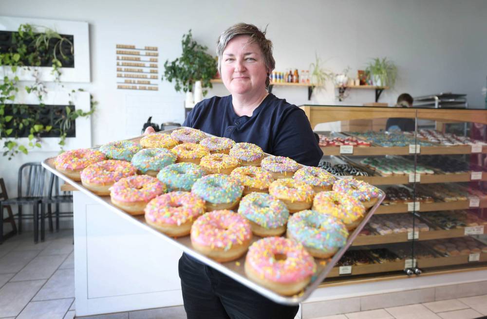 Ruth Bonneville / Free Press
‘The economy has been rough for us all,’ says Oh Doughnuts owner Amanda Kinden at the company’s Taylor Avenue location in Winnipeg.