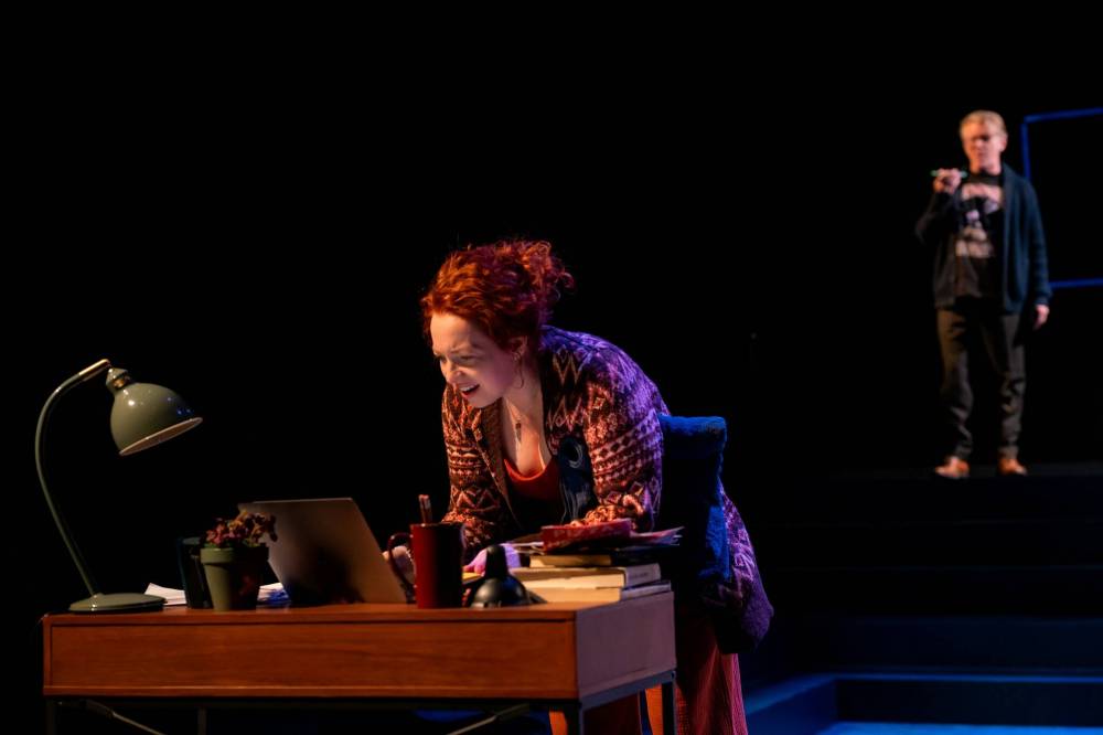 Joey Senft photo
Laura Olafson (left) answers a letter from Arne MacPherson in the production of Tiny Beautiful Things.