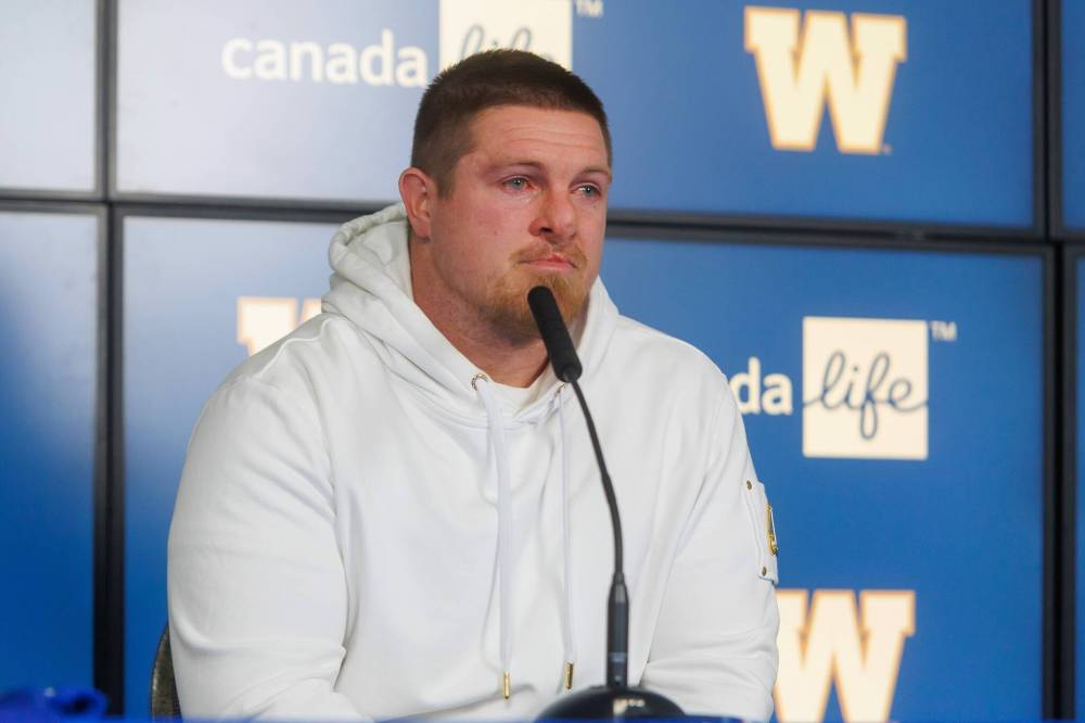 MIKE DEAL / FREE PRESS
Decorated linebacker Adam Bighill was emotional Tuesday at Princess Auto Stadium as he officially hung up his cleats on his CFL career as a Winnipeg Blue Bomber.