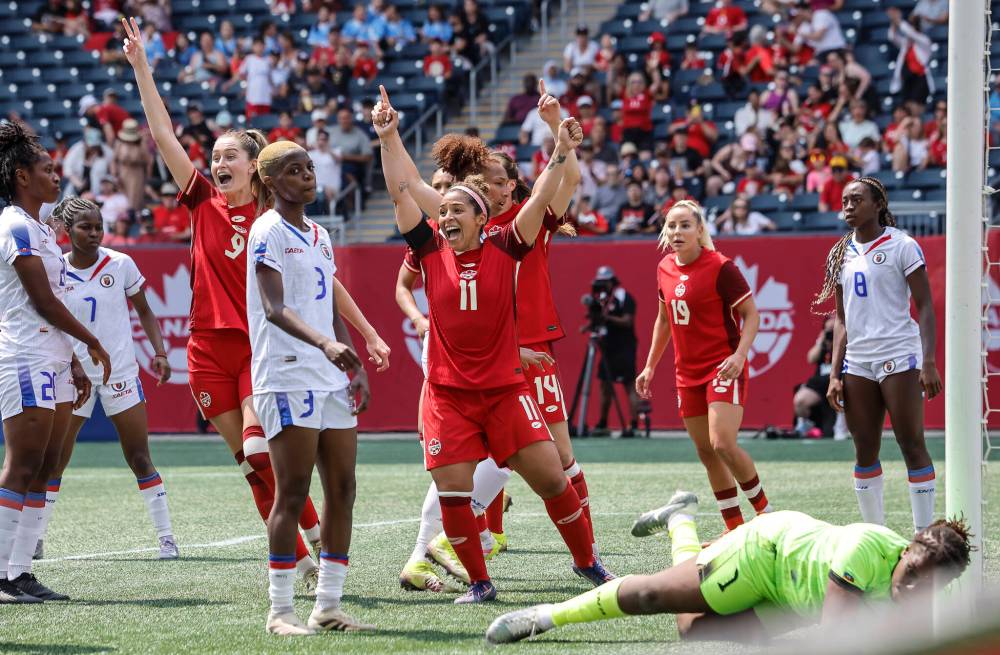 John Woods / THE CANADIAN PRESS FILES
Winnipeg’s Desiree Scott (11) celebrates a goal at Princess Auto Stadium last summer against Haiti. It was Scott’s final game wearing the Maple Leaf before retiring.