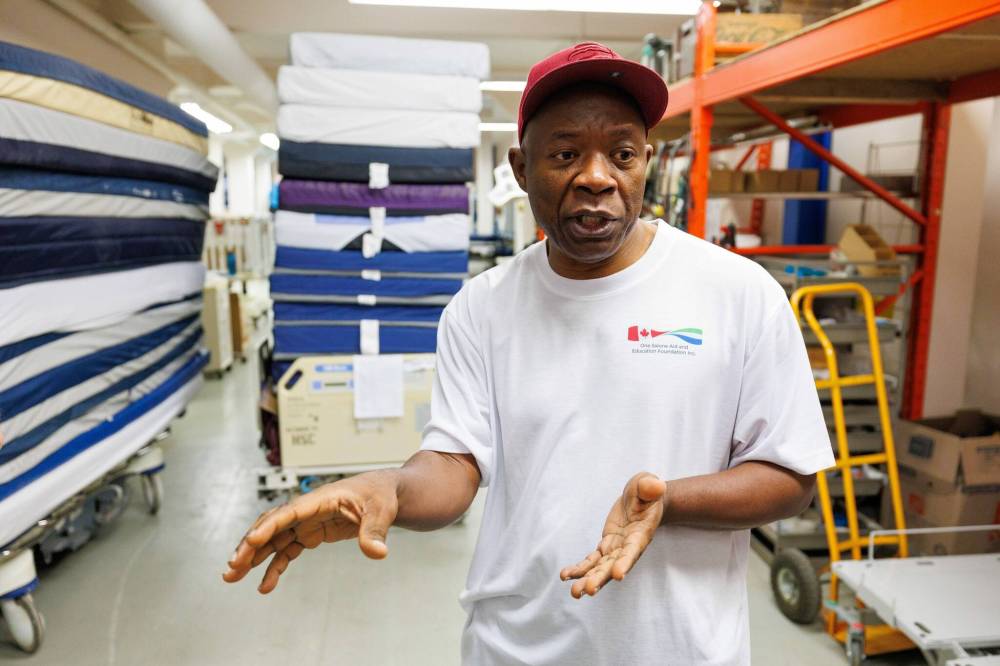 MIKE DEAL / FREE PRESS
Abdulai Konteh, along with his wife, Kanko Mansaray, has been working with their community to gather money and medical supplies to fill a container which will be shipped to the Kabala Government Hospital in northern Sierra Leone.