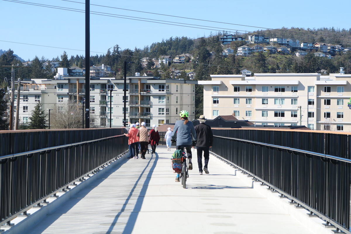 Cyclists and pedestrians enjoy safe passage over the Old Island Highway thanks to Colwood’s new Galloping Goose pedestrian and cycling bridge. (Ben Fenlon/Goldstream Gazette)