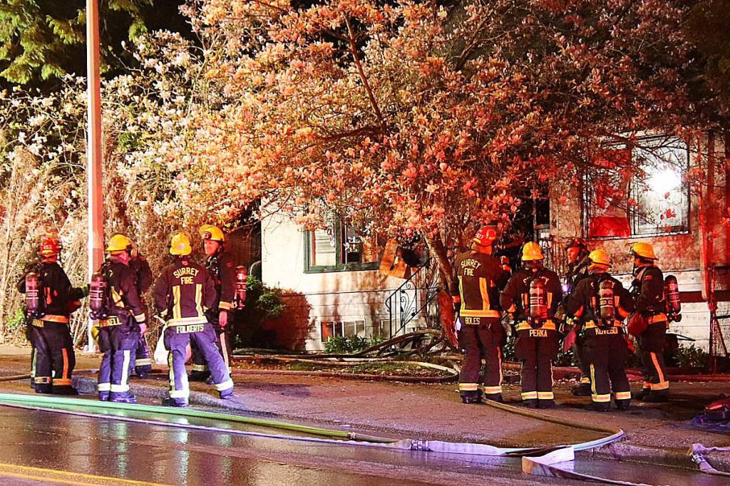 Surrey firefighters respond to a house fire in the early morning of Thursday, April 9 in the 12900-block of 104 Avenue. (1st Due Media/Contributed to Peace Arch News)