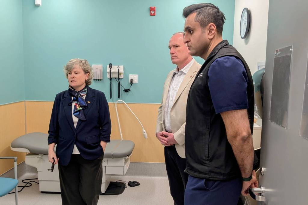 B.C. Health Minister Josie Osborne tours the new South Surrey Urgent and Primary Care Centre on Friday, April 10, with Fraser Health president and CEO Dermot Kelly (centre) and facility medical director Dr. Omar Shafi. (Alex Browne/Peace Arch News)