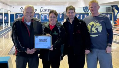 Special Olympics athletes Simone Myers, second from left, and Michael Booth, third from left, present a plaque to Alberni Men&rsquo;s Golf committee members Gerry Fagan, left, and Ted Stewart, right, at Rainbow Lanes. The Men&rsquo;s Golf Club donated $1,500 to Special Olympics last year. (Submitted photo/ Alberni Valley News)