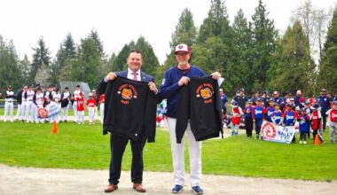 Whalley Little League president Clint Stewart, left, and Surrey Canadian Baseball Association president David Leavers with Surrey Whalley Bears shirts at Lionel Courchene Park on Sunday, April 12, 2026. (Facebook.com photo)