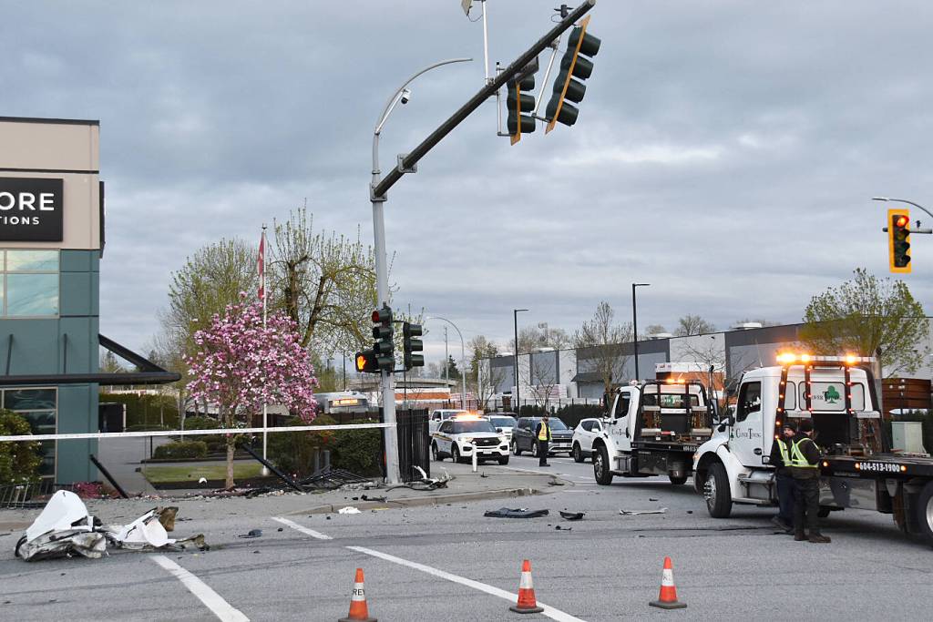 A car hit a traffic light pole at in East Cloverdale part of Surrey April 13. (South Fraser News Services/Contributed to Cloverdale Reporter)