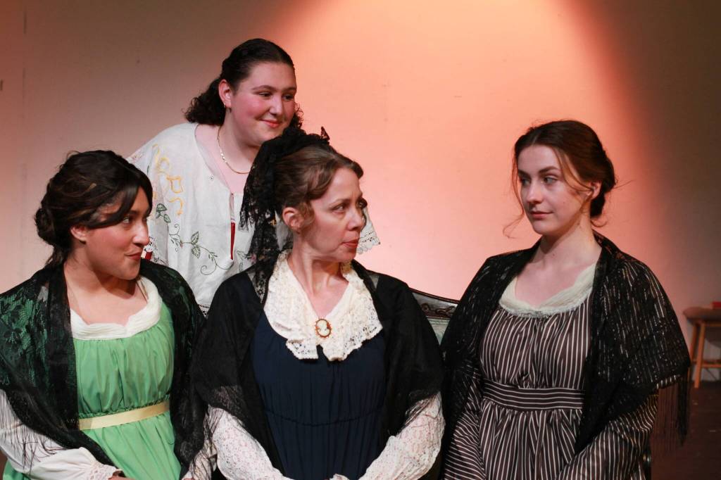 Daughters Marianne (Mallory Hema), Margaret (Miri Grad) and Elinor (Ally Rafter, far right) surround Mrs. Dashwood (Eileen Rothe) in Kate Hamill&rsquo;s adaptation of Jane Austen&rsquo;s classic Sense and Sensibility, presented by White Rock Players Club April 23 to May 10 at the Oceana PARC Playhouse. (Contributed to Peace Arch News)