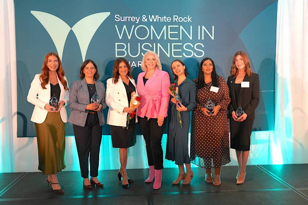 Joslyn Young, CEO of Surrey & White Rock Board of Trade (middle, in pink) with 2026 Women in Business award-winners (from left), Meghan Neufeld, Maxime Spakowski, Hermina Khara, Paula Bude, Raman Dhaliwal and Andie van der Eerden (not pictured is Nicole Heidari), on Thursday, April 16, 2026. (SWRBOT/Contributed to Surrey Now-Leader)