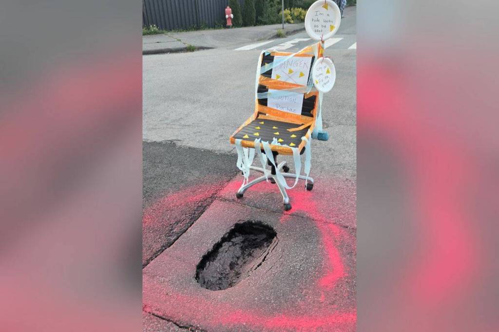 The pothole in the intersection of 128 Street and 114B Ave was about two feet wide and a foot and a half wide, and about two inches deep. (Contributed to Surrey Now-Leader)
