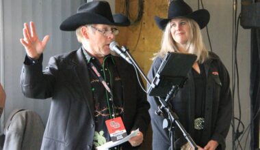 Rick Hugh, 1st vice-president of the Cloverdale Rodeo and Exhibition Association, addresses those gathered for the Cloverdale Rodeo Luncheon in a previous year, while Rodeo Association president Kathy Sheppard looks on. Hugh said the Cloverdale Rodeo and Country Fair offers immense value for money. (Photo: Malin Jordan)