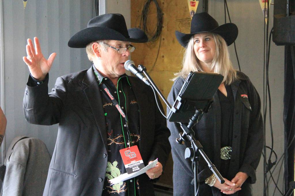 Rick Hugh, 1st vice-president of the Cloverdale Rodeo and Exhibition Association, addresses those gathered for the Cloverdale Rodeo Luncheon in a previous year, while Rodeo Association president Kathy Sheppard looks on. Hugh said the Cloverdale Rodeo and Country Fair offers immense value for money. (Photo: Malin Jordan)