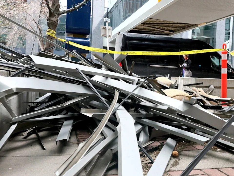 Damage to a Plus 15 on 2nd Avenue near 3rd Street S.W. due to a wind storm in Calgary on Friday.