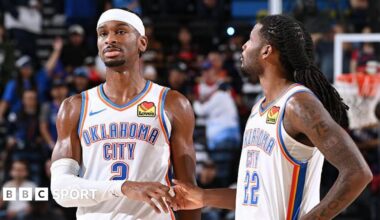 Shai Gilgeous-Alexander (left) and Cason Wallace (right) of the Oklahoma City Thunder shake hands