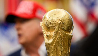The soccer World Cup trophy sits in front of President Donald Trump
