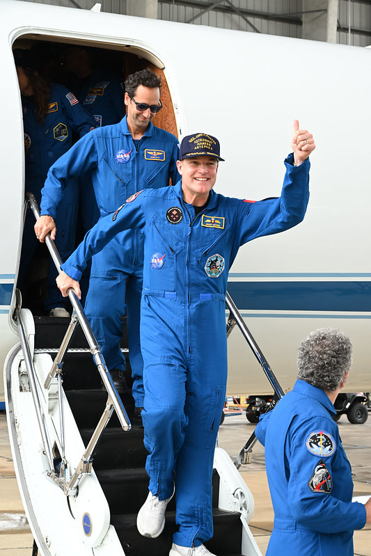 Artemis II Mission Specialist Jeremy Hansen returns home to Houston, stepping off a plane at Ellington Airport near NASA's Johnson Space Center, on Saturday, April 11, 2026, following his 10-day mission around the Moon.