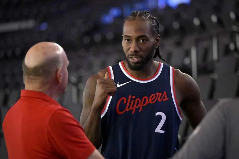 Sep 30, 2024; Inglewood, CA, USA; Los Angeles Clippers forward Kawhi Leonard (2) talks with team owner Steve Ballmer during media day at Intuit Dome. Mandatory Credit: Jayne Kamin-Oncea-Imagn Images
