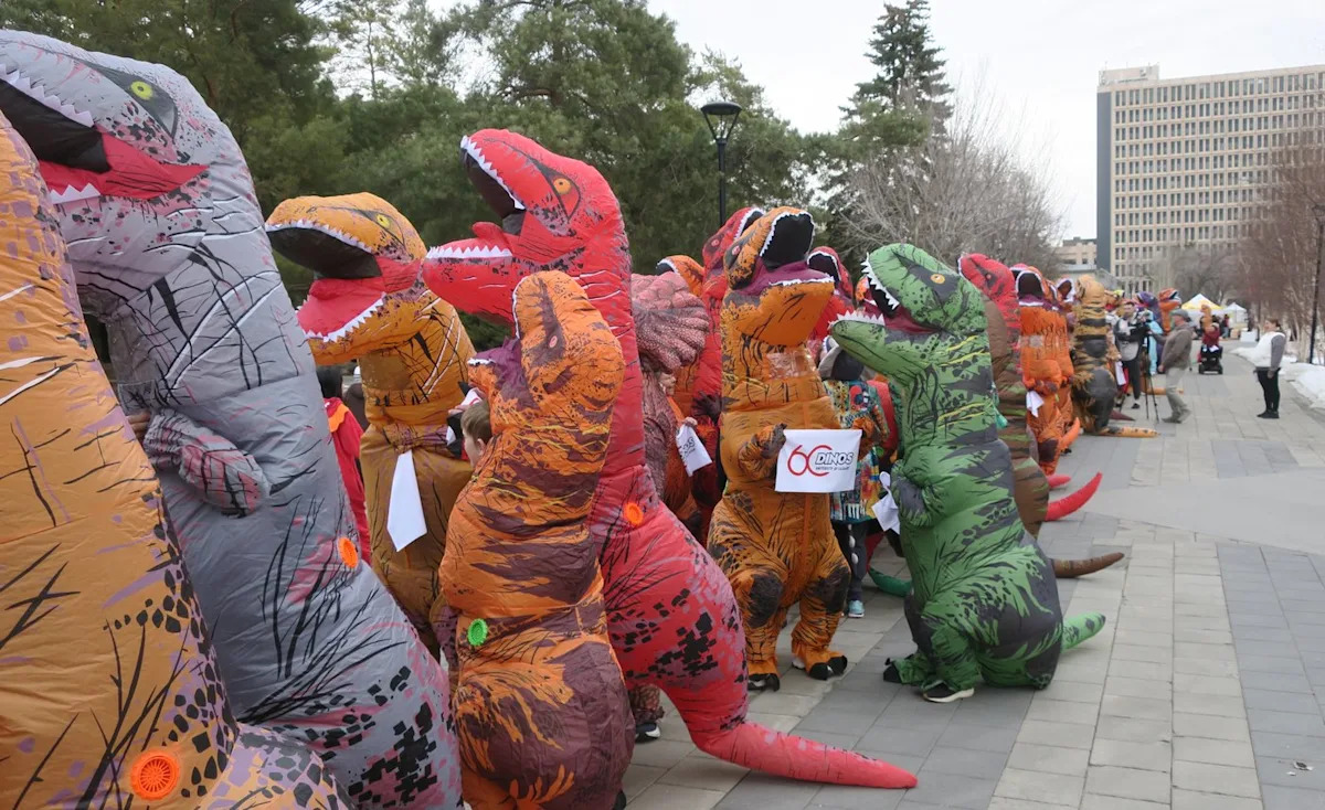 Calgary university sets record for largest gathering of people dressed as dinosaurs