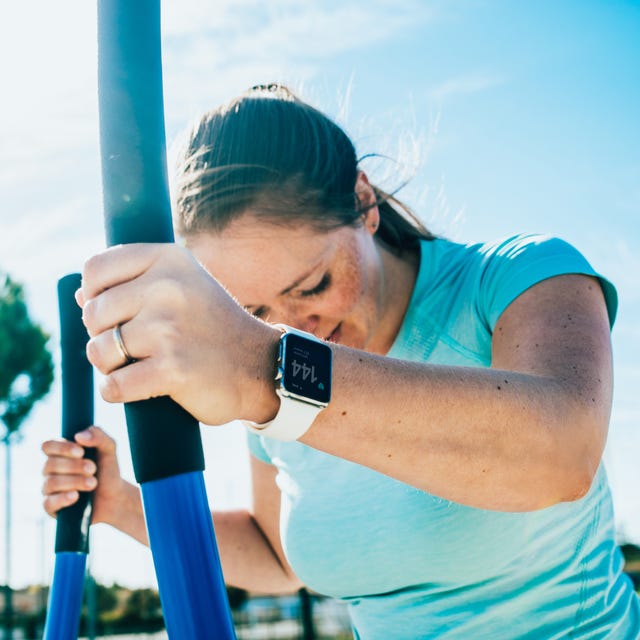 Woman doing cross training on a outdoor stepper. Woman doing cross training on a outdoor stepper.