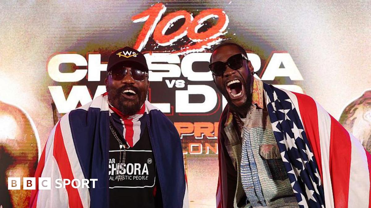 Deontay Wilder and Derek Chisora pose for cameras at a news conference