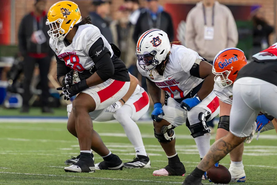 American Team offensive lineman Max Iheanachor (58) of Arizona State and American Team offensive lineman Jeremiah Wright (77) of Auburn line up for a play during American Senior Bowl practice. Vasha Hunt-Imagn Images&nbsp; &nbsp;