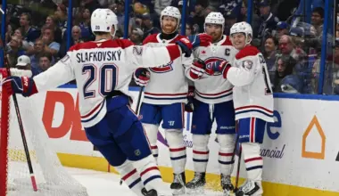Montreal Canadian right wing Cole Caufield (13) celebrates with his teammates after scoring a goal in the second period against the Tampa Bay Lightning at Benchmark International Arena.
