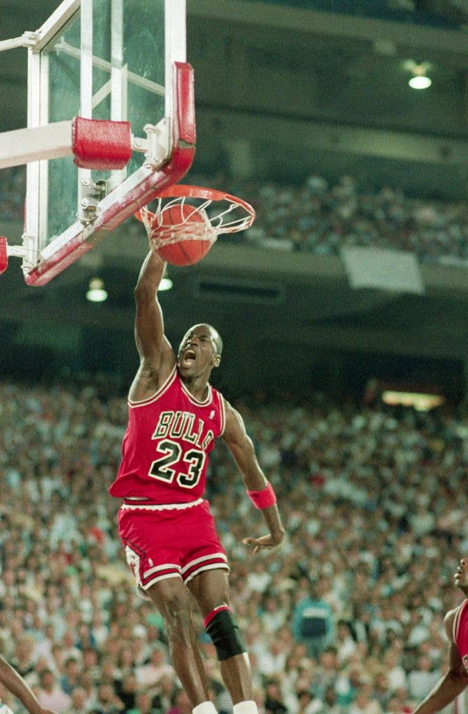 Bulls superstar Michael Jordan slams two of his 36 points, and screams, to lead the Bulls to a 105-95 win over the Detroit Pistons and even up the series 1-1 5/12, May 12, 1988