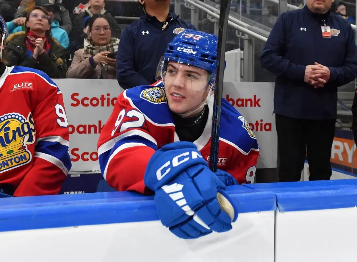 Edmonton Oil Kings forward Miroslav Holinka observes play from the bench.