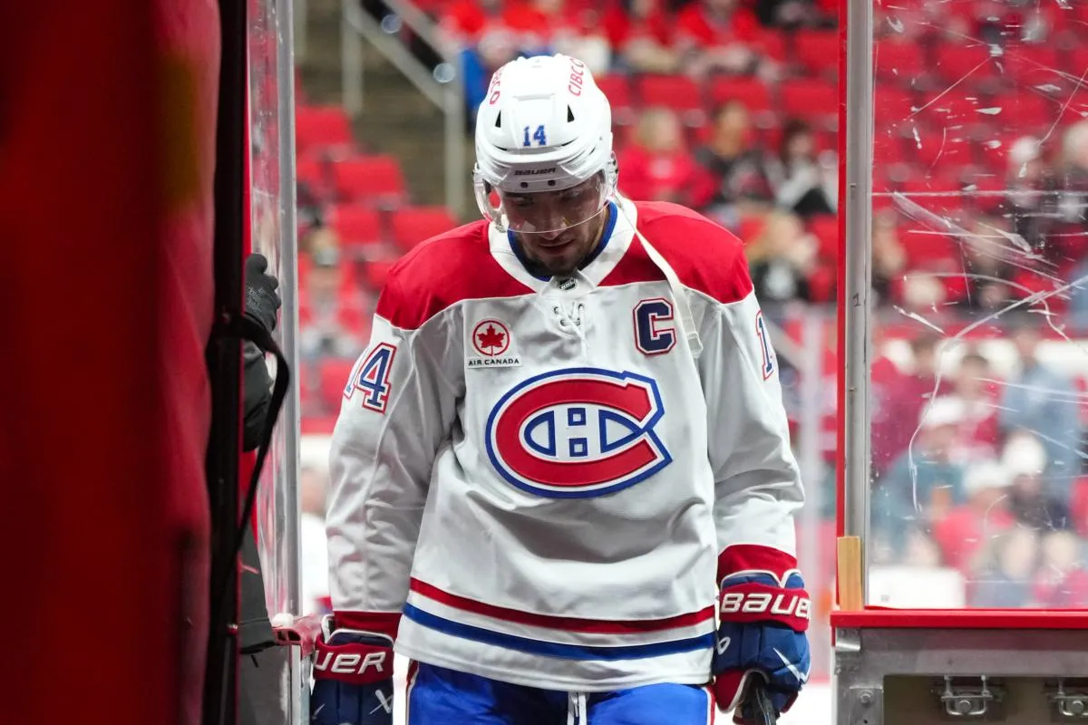 Montreal Canadiens center Nick Suzuki (14) comes off the ice after the warm-ups before the game against the Carolina Hurricanes at Lenovo Center.