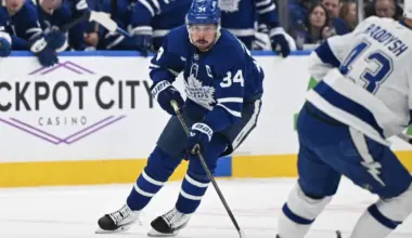 Toronto Maple Leafs forward Auston Matthews (34) skates with the puck against the Tampa Bay Lightning in the first period at Scotiabank Arena.