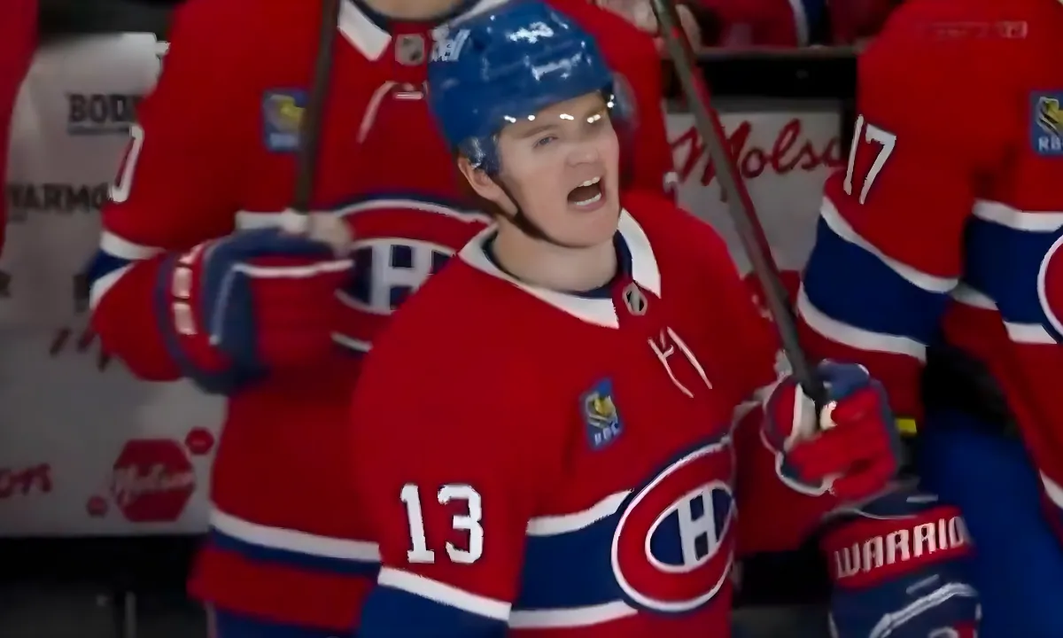 Photo of Cole Caufield yelling on the Canadiens bench.