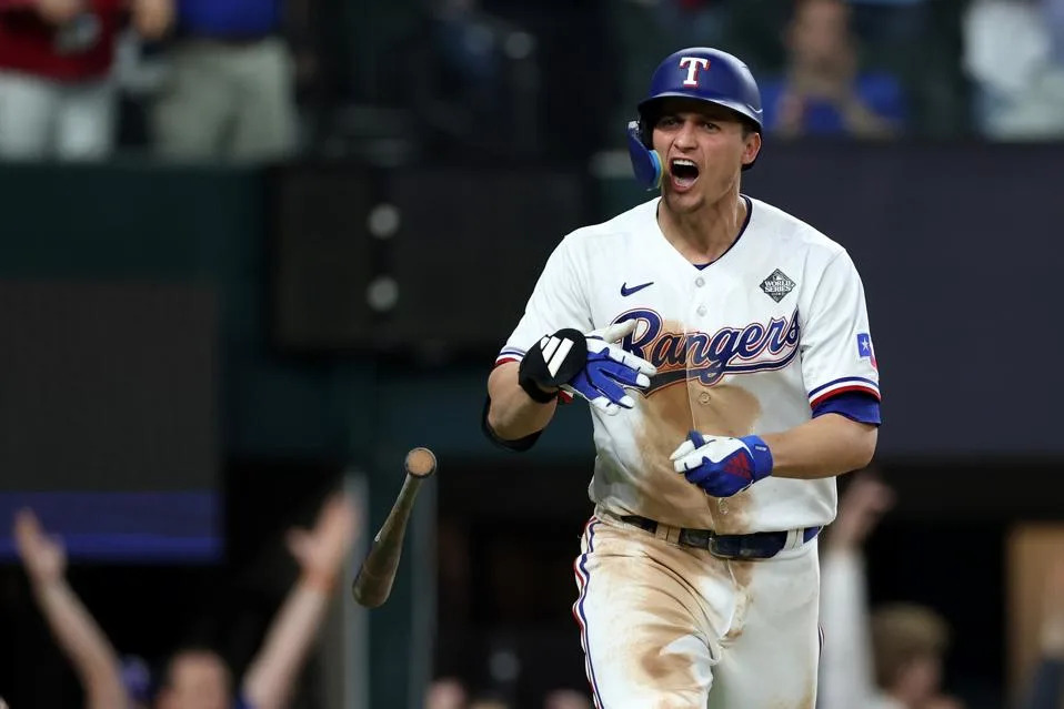 Corey Seager reacts to hitting a home run.