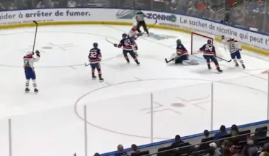 Photo of Alex Newhook scoring third goal of the game against the New York Islanders.