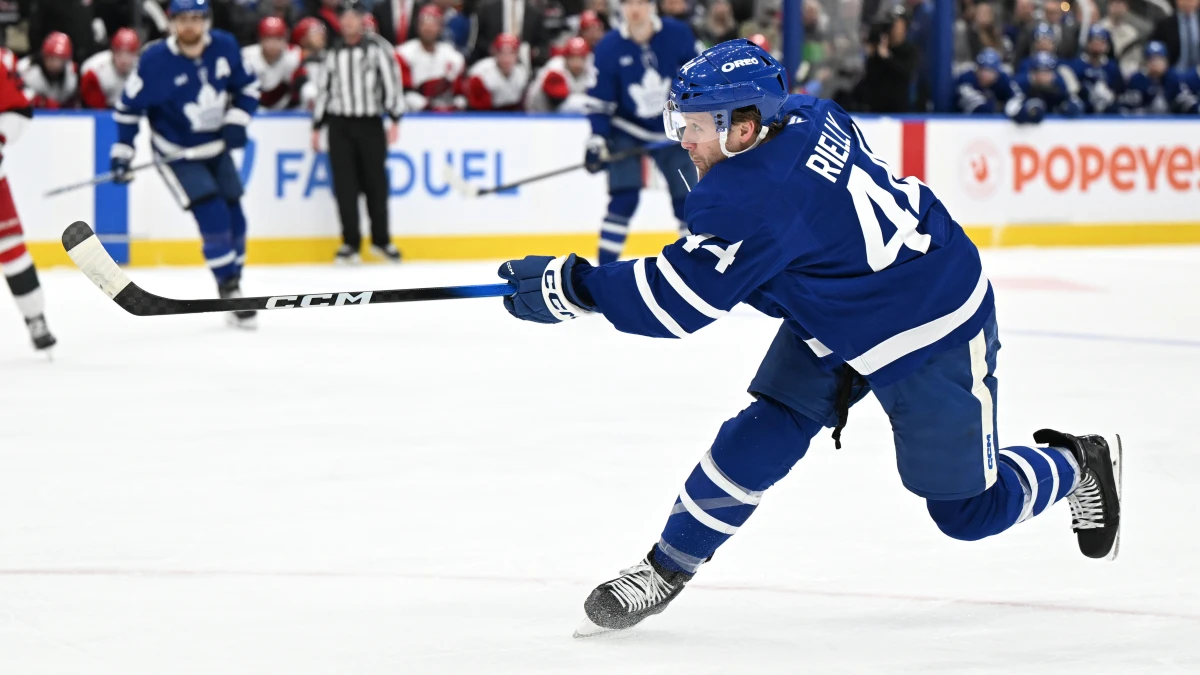 Toronto Maple Leafs defenseman Morgan Rielly (44) hits a slapshot against the Carolina Hurricanes in the first period at Scotiabank Arena.