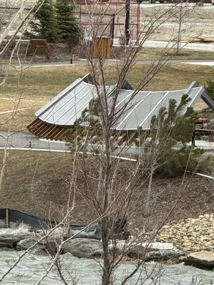 Collapsed steel pergola in Bayview Park along the canal in Airdrie, photographed around 3 p.m. April 24 after strong winds moved through the area. Photo / Anthea Paterson