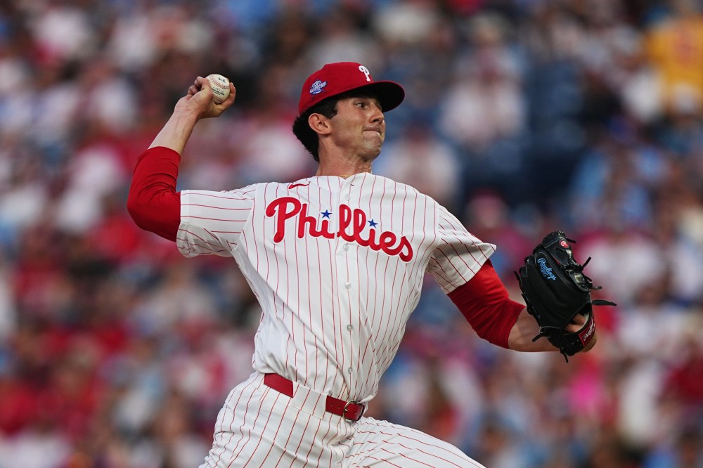 Philadelphia Phillies' Andrew Painter pitches during the first inning of a baseball game against the Washington Nationals, Tuesday, March 31, 2026, in Philadelphia. (AP Photo/Matt Rourke)