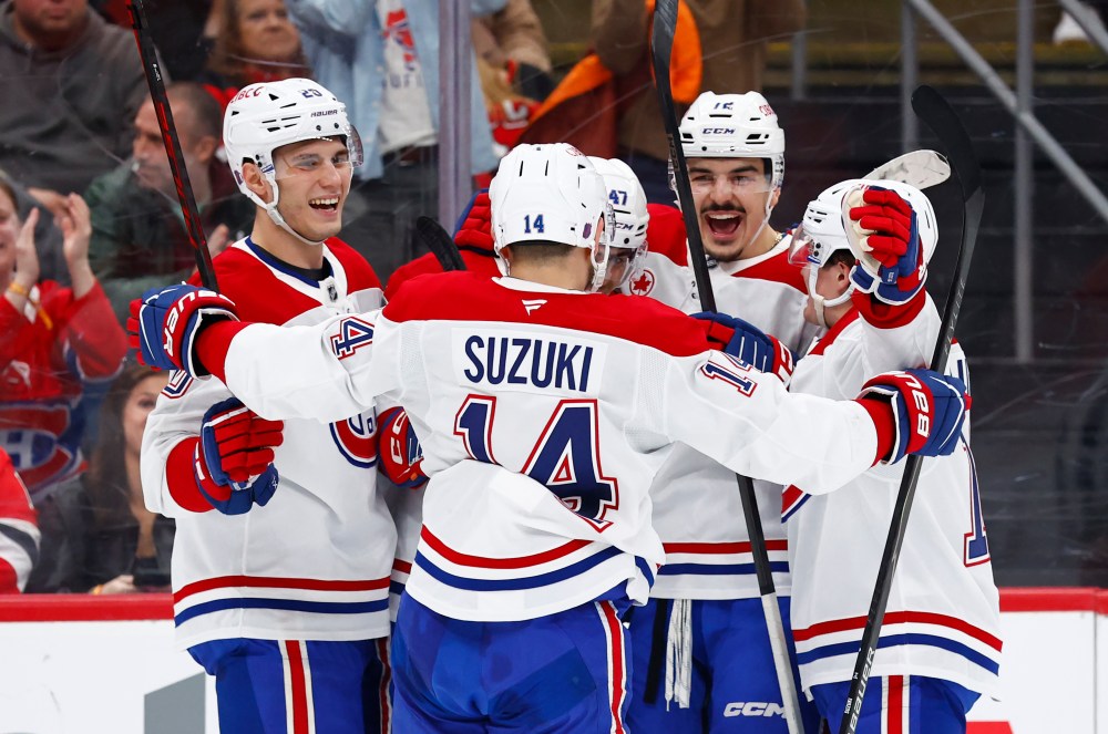 The Montréal Canadiens players celebrate after a goal by defenseman Jayden Struble (47) during the first period of an NHL hockey game against the New Jersey Devils, Saturday, April 4, 2026, in Newark, N.J. (AP Photo/Noah K. Murray)