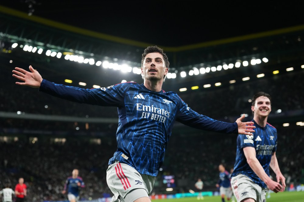 Arsenal's Kai Havertz celebrates after scoring his sides first goal during the Champions League quarterfinals, first leg, soccer match between Sporting CP and Arsenal, in Lisbon, Tuesday, April 7, 2026. (AP Photo/Armando Franca)