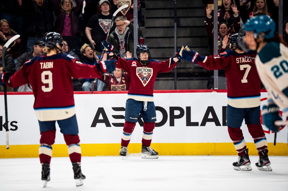 Montreal Victoire's Skylar Irving (centre) celebrates with teammates Kati Tabin (9) and Laura Stacey (7) after scoring during second period PWHL hockey action against the Seattle Torrent in Laval, Que., on Tuesday, April 7, 2026. THE CANADIAN PRESS/Christopher Katsarov
