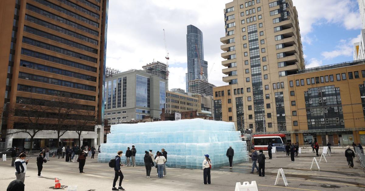 Drake’s ‘Iceman’ sculpture downtown sparks police response as fans hack off chunks, set fire to blocks - Toronto Star
