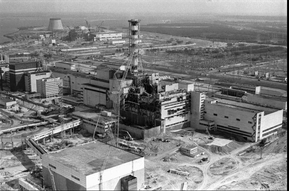 FILE - The Chernobyl nuclear plant is seen in an aerial view, showing the damage from an explosion and fire on April 26, 1986, that sent a radioactive plume over Europe. (AP Photo/ Volodymyr Repik, File)