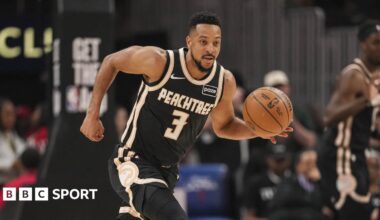 Atlantic Hawks' CJ McCollum dribbles the basketball