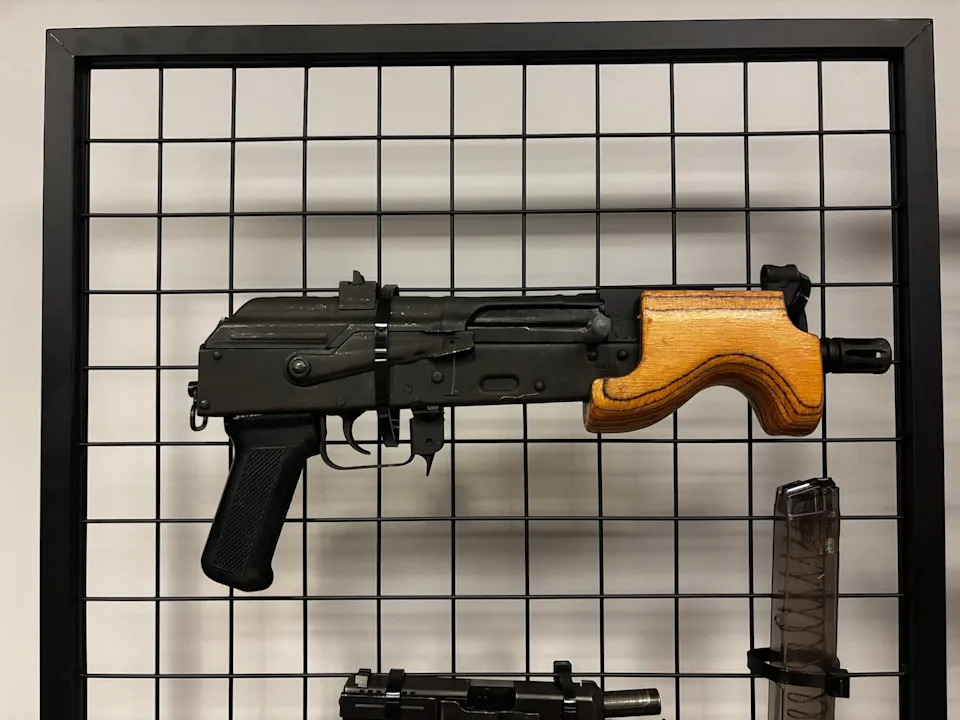 Police in London, Ont., displayed a Draco semi-automatic firearm on May 28, 2025. The weapon is similar to the type of gun that smuggler Erhan John Er sought to obtain from a Florida gun dealer. According to Er's plea agreement, the purchase was deemed suspicious and was declined.