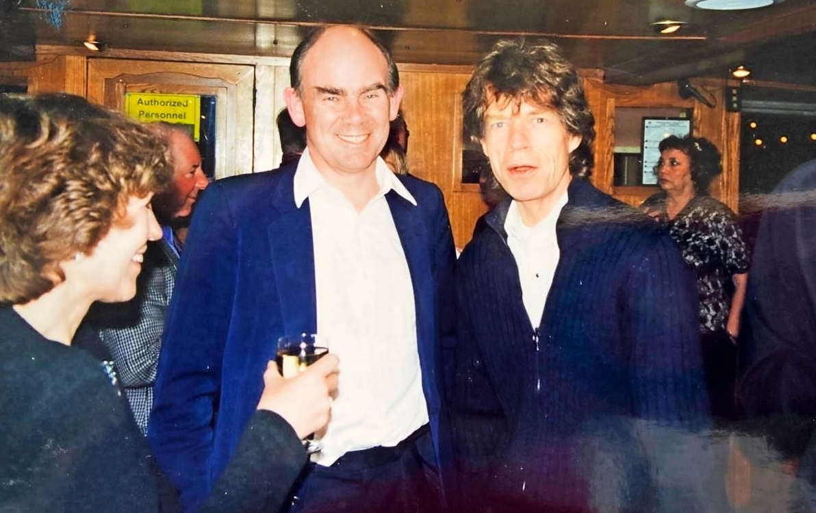 Mick Jagger with Paddy at an event.