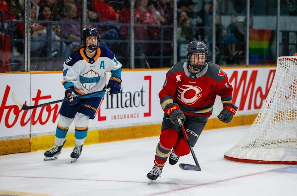  Jaime Bourbonnais, left, of the Sirens and Alexa Vasko (10) of the Charge skate after the puck in PWHL action at TD Place in Ottawa on Saturday.