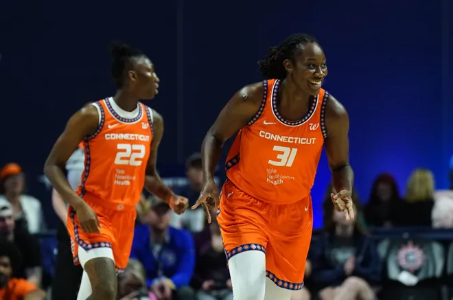 Jun 6, 2025; Uncasville, Connecticut, USA; Connecticut Sun center Tina Charles (31) reacts after her three point basket against the Atlanta Dream in the first half at Mohegan Sun Arena. Mandatory Credit: David Butler II-Imagn Images
